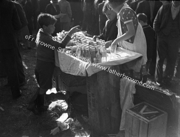 BOY SELLING MINERALS AT COBHAM'S AIR CIRCUS